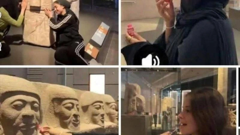 فتاة تضع مكياج لتمثال رمسيس